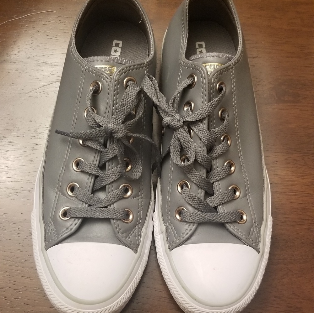 Gray leather converse